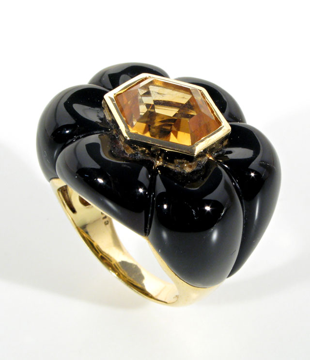 Appraisal: CITRINE BLACK ONYX AND EIGHTEEN KARAT GOLD COCKTAIL RING the