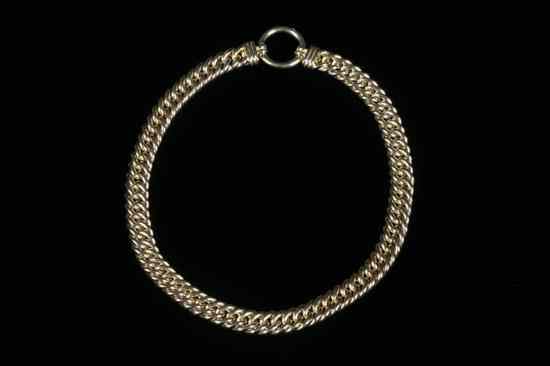 Appraisal: ITALIAN K YELLOW GOLD BRIGHT-POLISHED FLEXIBLE LINK STRAP CHOKER WITH