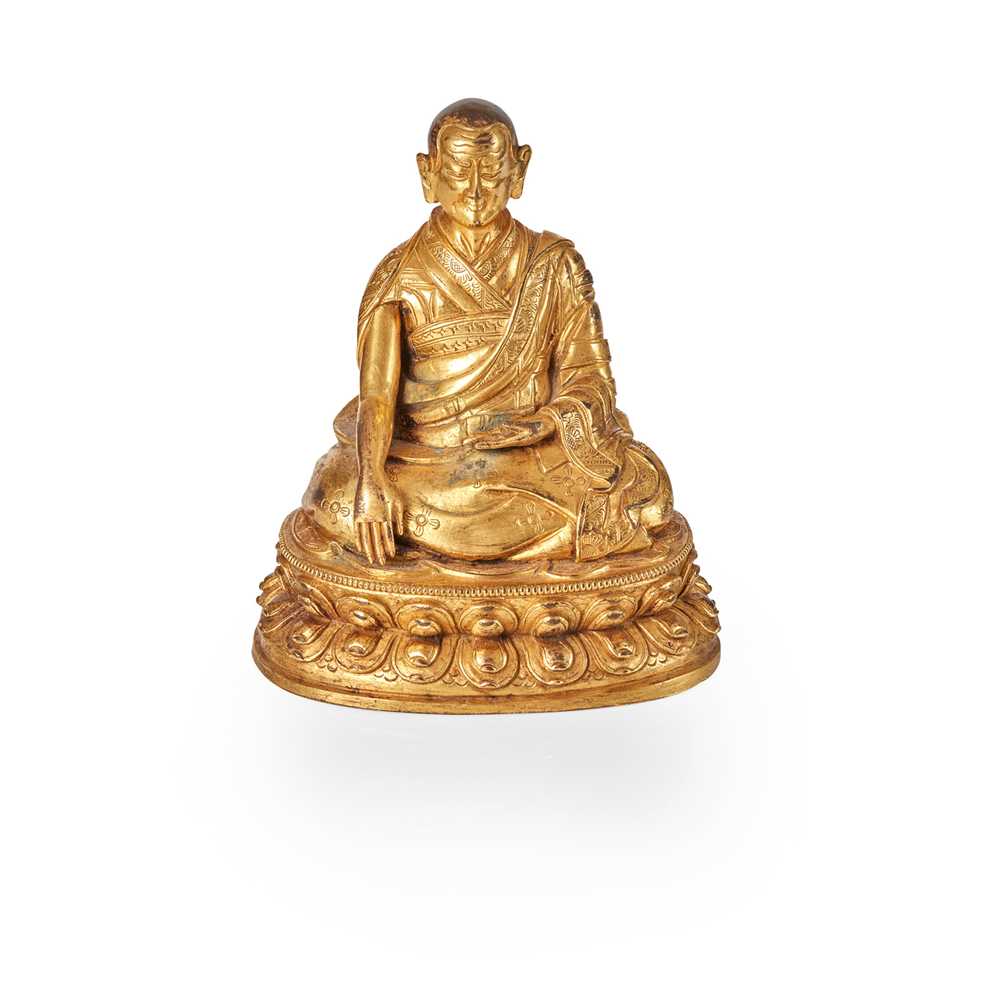 Appraisal: GILT-BRONZE FIGURE OF A LAMA cast seated on a double