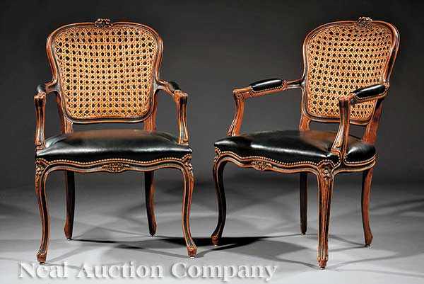 Appraisal: A Pair of Louis XV-Style Carved Fruitwood and Ebonized Fauteuils