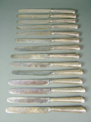 Appraisal: Fourteen Victorian silver table knives comprising eight by 'JG' Birmingham