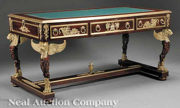 Appraisal: An Empire-Style Gilt Bronze-Mounted Mahogany Bureau Plat inset green tooled