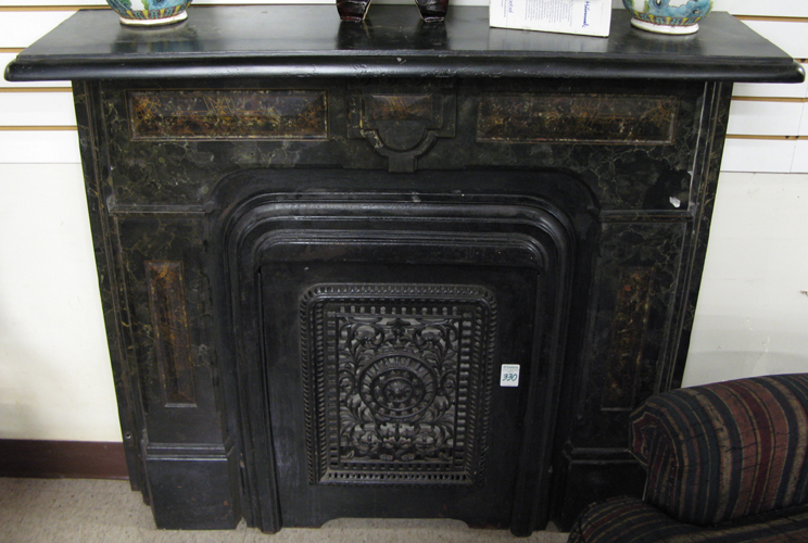 Appraisal: LATE VICTORIAN CAST AND MARBLEIZED IRON FIREPLACE SURROUND American c