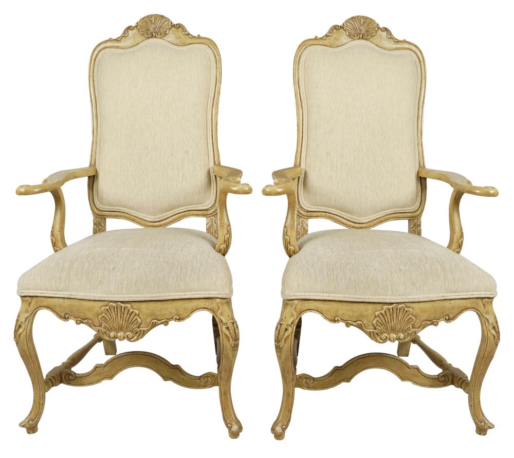 Appraisal: PAIR OF KARGES CARVED AND PAINTED FAUTEUILSwith cream-colored fabric inches