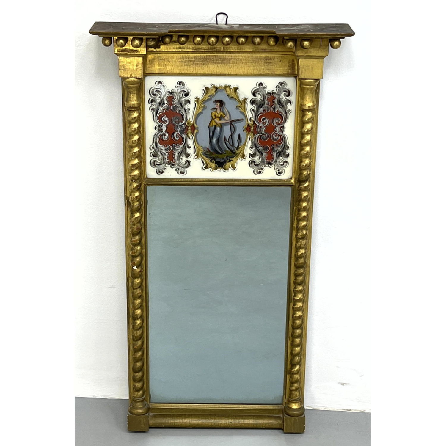 Appraisal: Gilt Painted Antique Trumeau Mirror Twisted spindle trim Eglomise glass