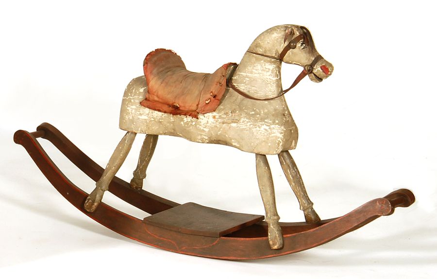 Appraisal: PAINTED WOODEN ROCKING HORSE American th CenturyWhite horse with red