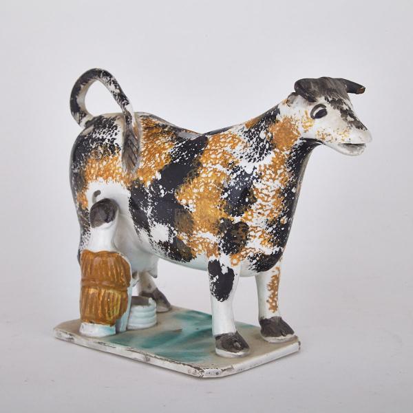 Appraisal: Staffordshire Pottery Cow Creamer early th century with a milkmaid