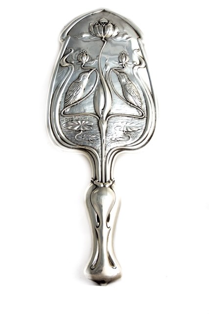 Appraisal: A silver mounted Art Nouveau lady's hand mirror fitted with