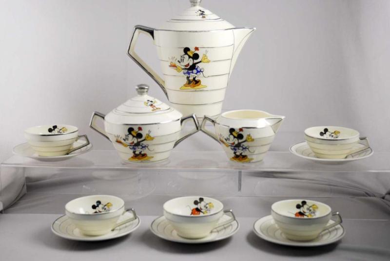 Appraisal: French Walt Disney Mickey Minnie Mouse Tea Set Description Includes