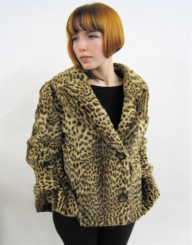 Appraisal: LADY'S LEOPARD OR NATURAL SPOTTED FUR JACKET with cuffed sleeves