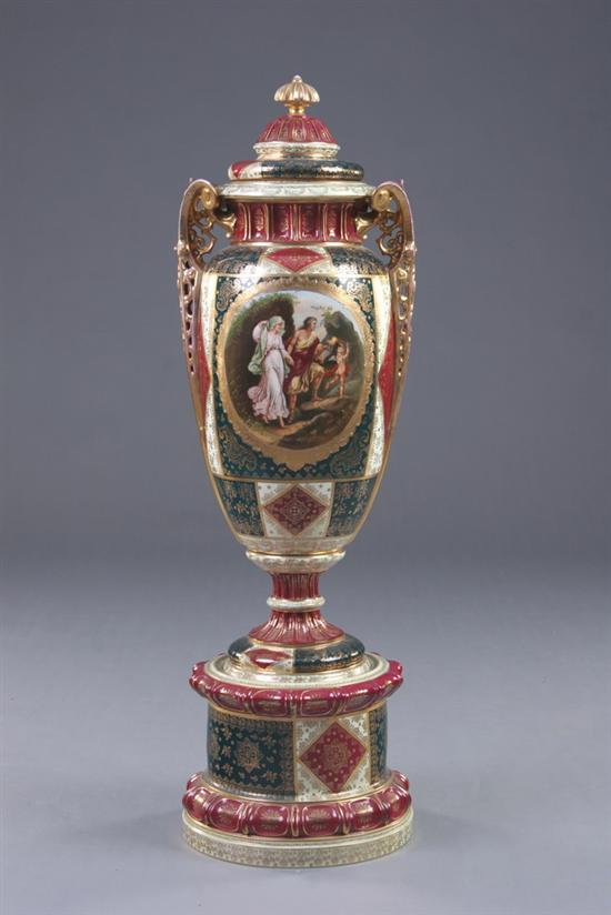 Appraisal: LARGE VIENNA PORCELAIN URN AND COVER early th century Magenta