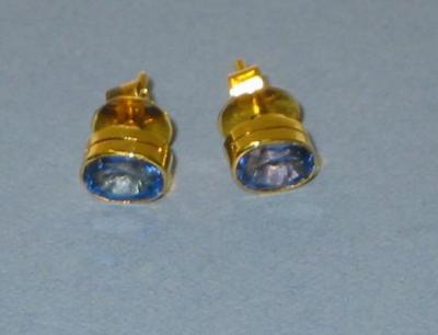 Appraisal: A PAIR OF SAPPHIRE EAR STUDS the blue oval cut