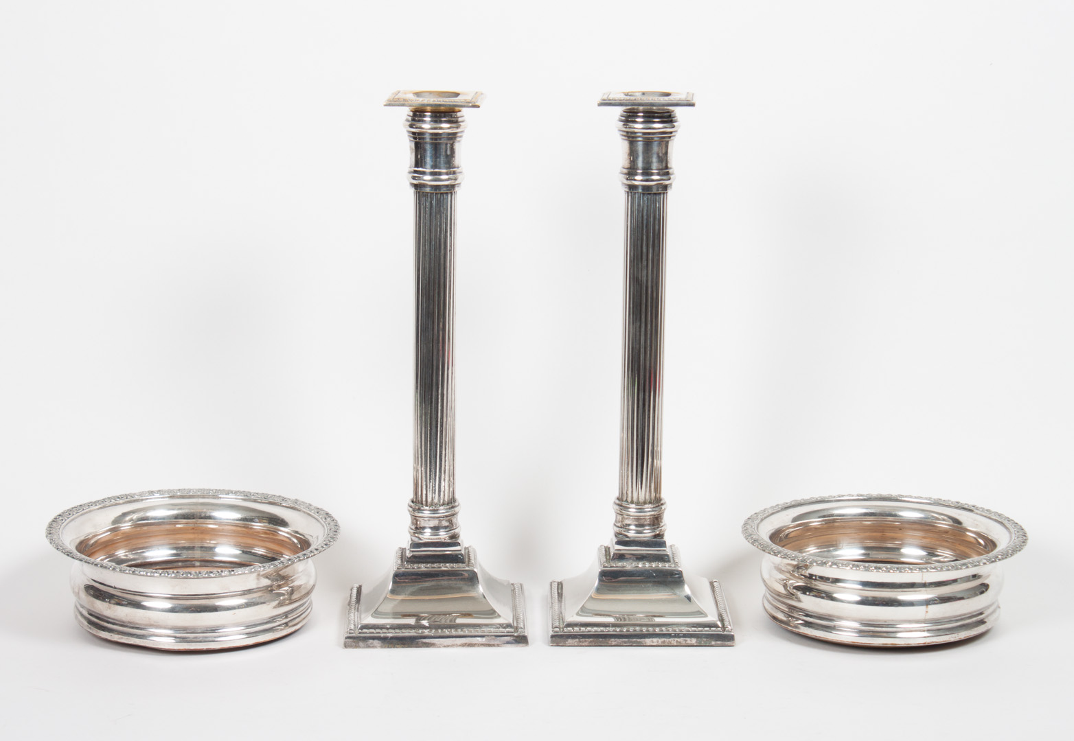 Appraisal: Pair of silver-plated columnar candlesticks in H together with a