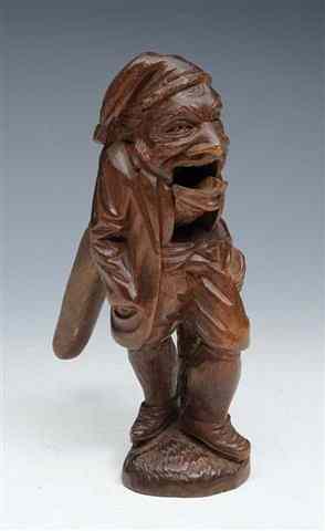 Appraisal: A TH CENTURY BLACK FOREST CARVED WOODEN NUTCRACKER in the