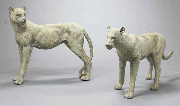 Appraisal: A Pair of Bronze Cheetahs height in length in depth