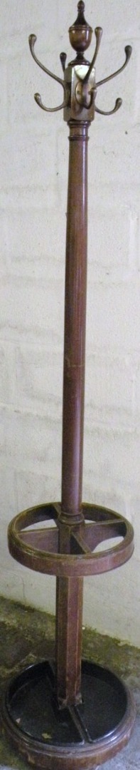 Appraisal: A thC beech bentwood coatstand set with four metal pegs