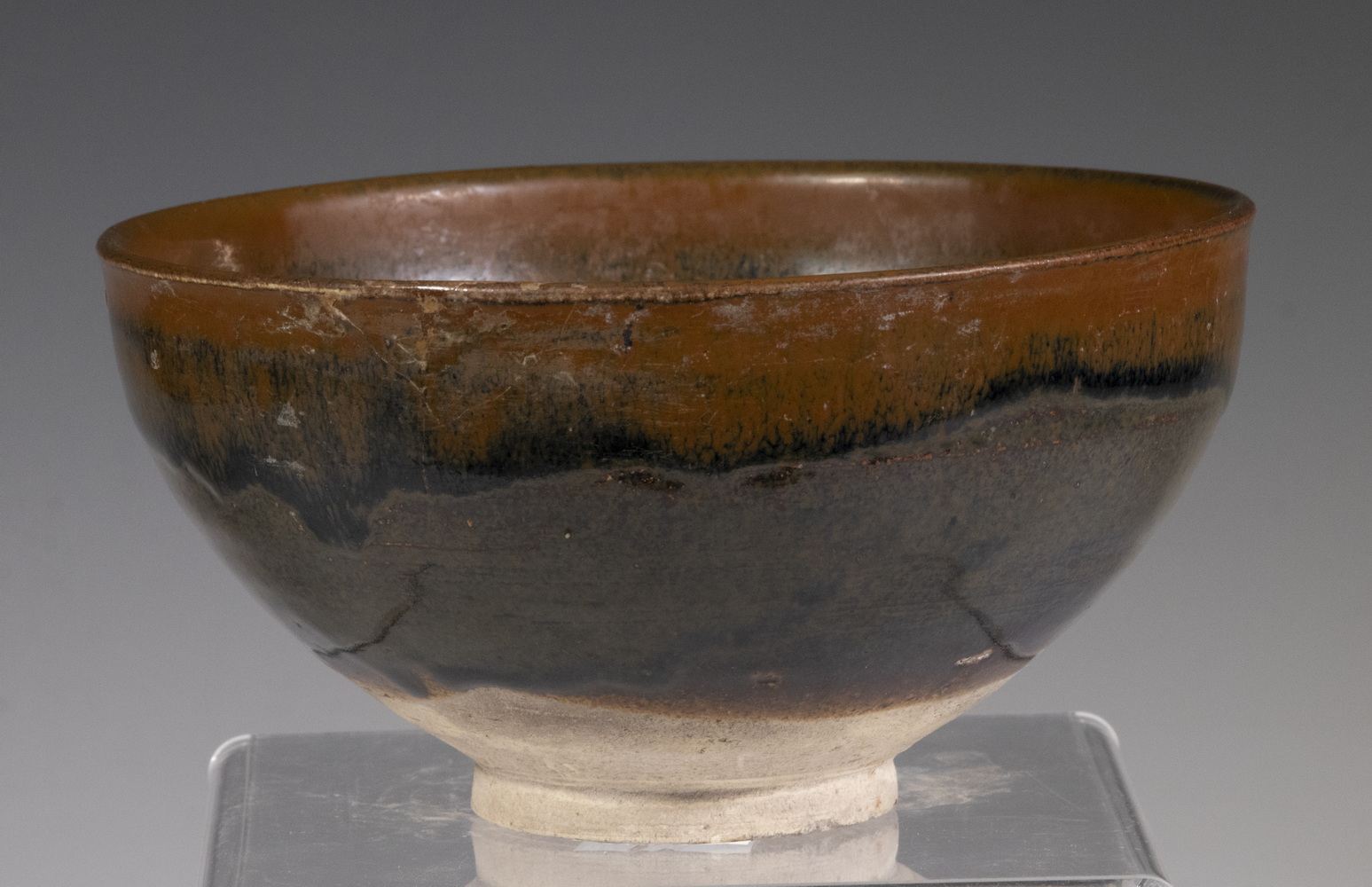 Appraisal: RUSSET-SPLASHED BLACK-GLAZED BOWL YUAN DYNASTY TH C Deep Bowl with