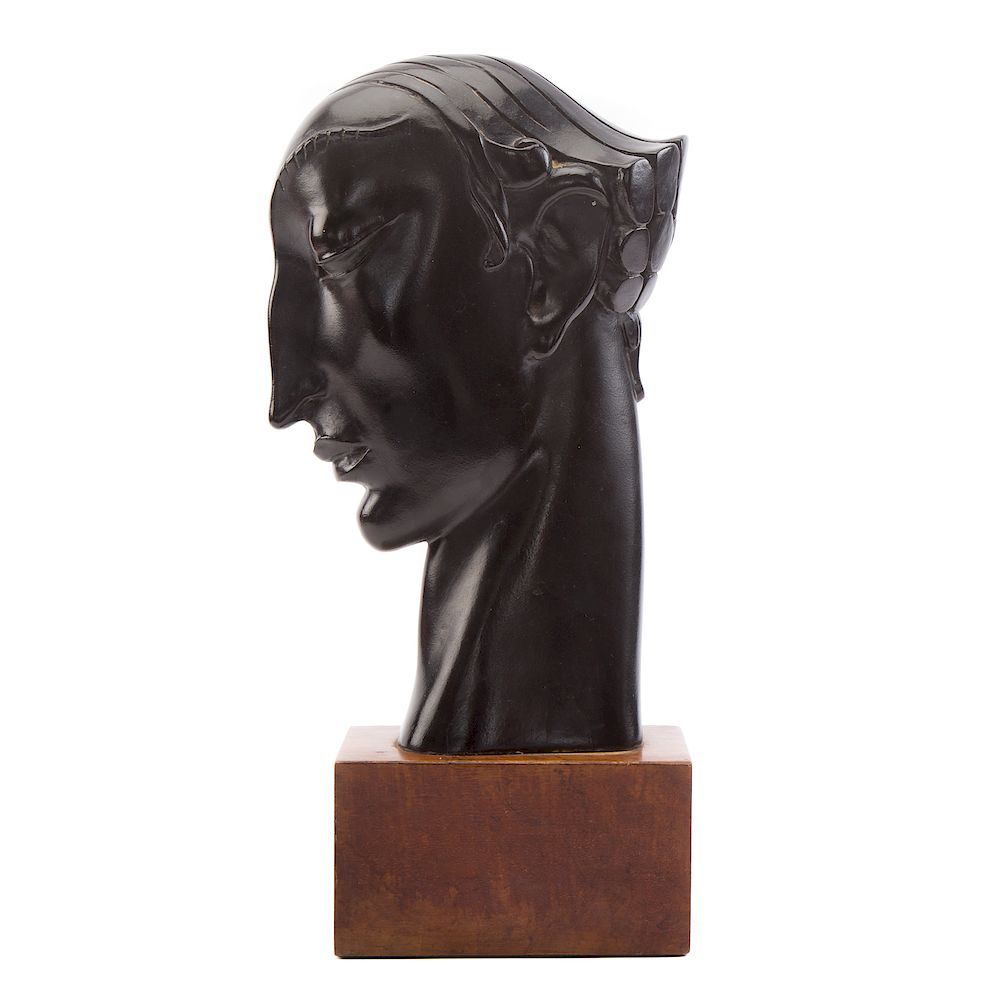 Appraisal: Art Deco Carved Ebonized Wood Head circa s stylized male