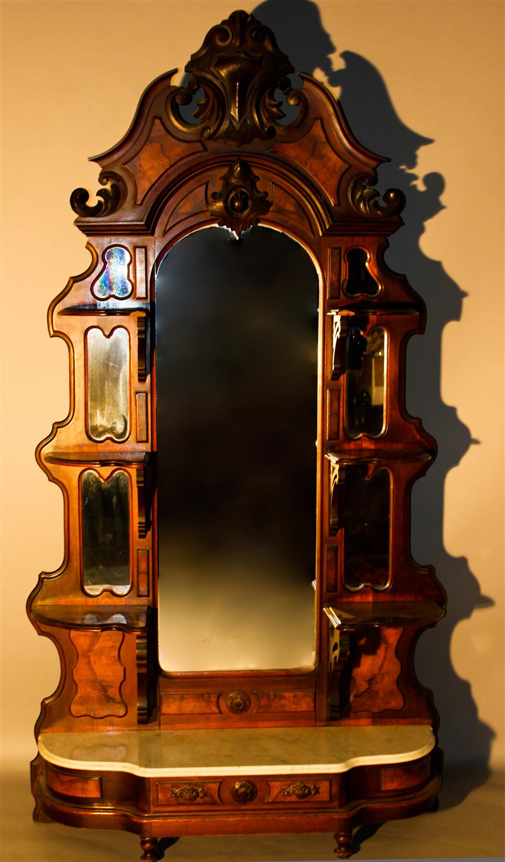 Appraisal: VICTORIAN CARVED WALNUT HALL ETAGERE WITH MIRROR AND MARBLE BASE