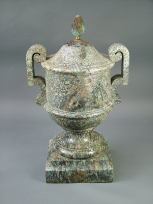 Appraisal: A neo-classical style variegated green marble twin handled pedestal vase