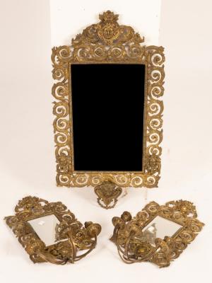 Appraisal: A gilt brass Florentine style wall mirror with mask head