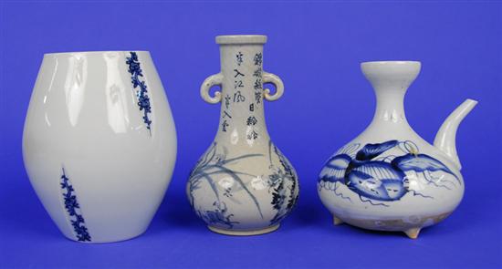 Appraisal: THREE JAPANESE BLUE AND WHITE WARES including two vases and