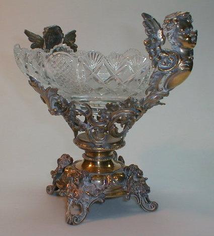 Appraisal: A heavy cut glass dish supported on a gilt metal