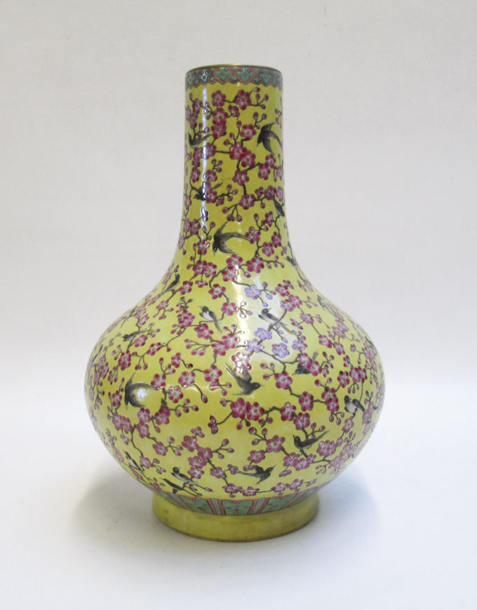 Appraisal: CHINESE FAMILLE JAUNE PORCELAIN VASE a standard bottle-form base with