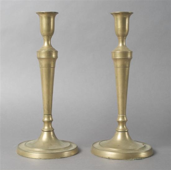 Appraisal: A Pair of Brass Candlesticks Height inches