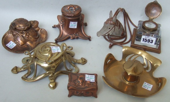 Appraisal: Six Art Nouveau brass and copper novelty inkwells one modelled