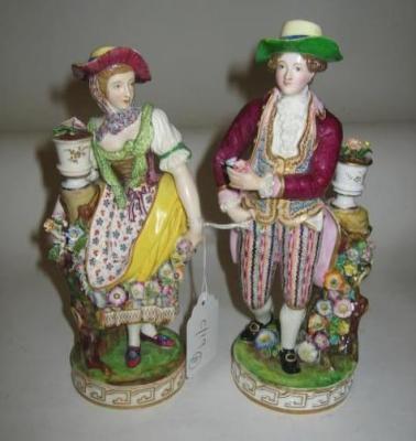 Appraisal: A PAIR OF MINTON PORCELAIN FIGURES th century modelled as