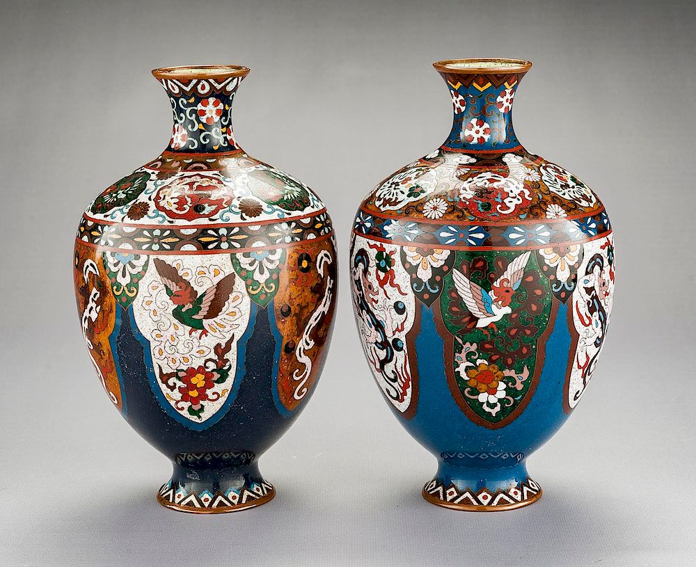 Appraisal: Pair of Chinese Cloisonne Dragon Phoenix Vases DESCRIPTION Pair of