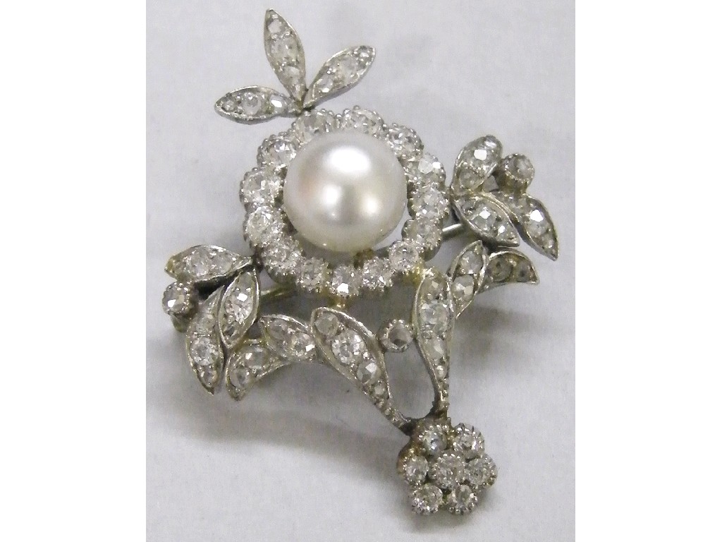 Appraisal: Attractive white gold diamond and pearl flower brooch with a