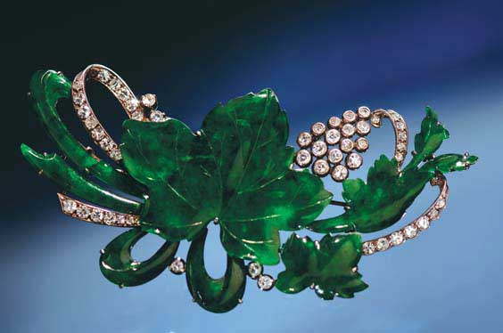 Appraisal: JADE AND DIAMOND LEAF BROOCH Very fine antique jade and