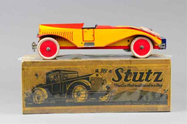 Appraisal: MARX STUTZ COUPE Lithographed tin yellow and red body key