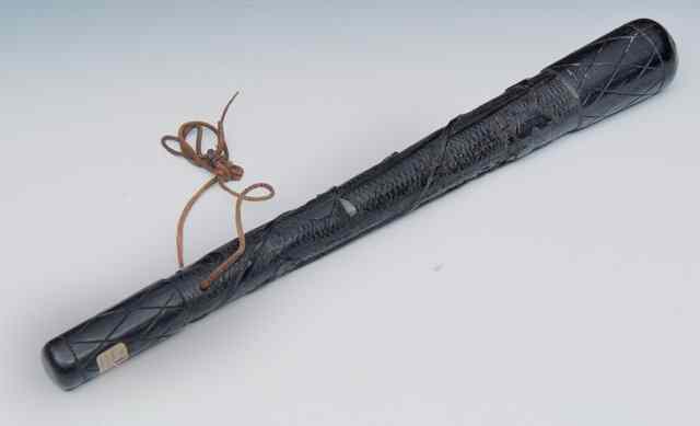 Appraisal: A CARVED IRISH BOGWOOD SHILLELAGH carved with shamrocks long