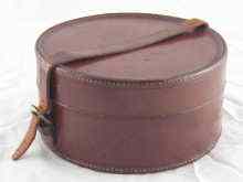 Appraisal: A leather collar box cm diameter