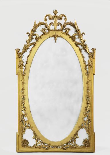 Appraisal: Large Giltwood Overmantel Mirror ca of classical inspiration the oval