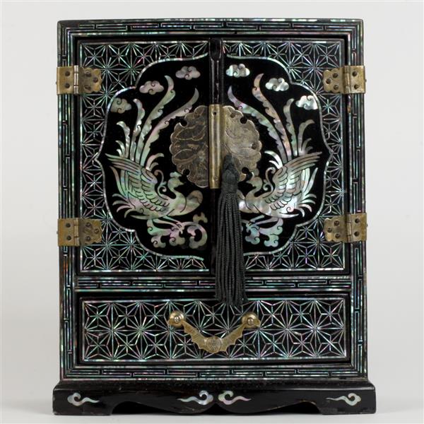 Appraisal: Chinese black lacquer jewelry cabinet with mother of pearl inlay