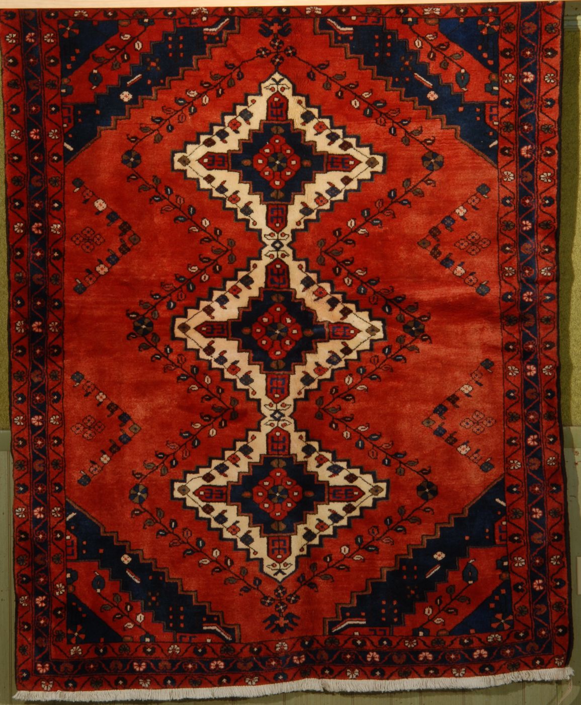 Appraisal: ORIENTAL RUG HAMADAN ' x ' Three ivory diamond medallions