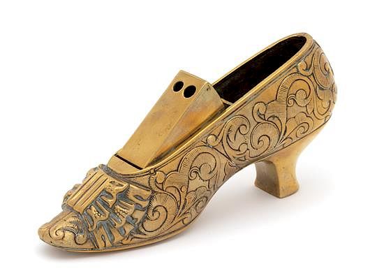 Appraisal: An English Brass Lady's Shoe-Form Cigar Cutter Height x width