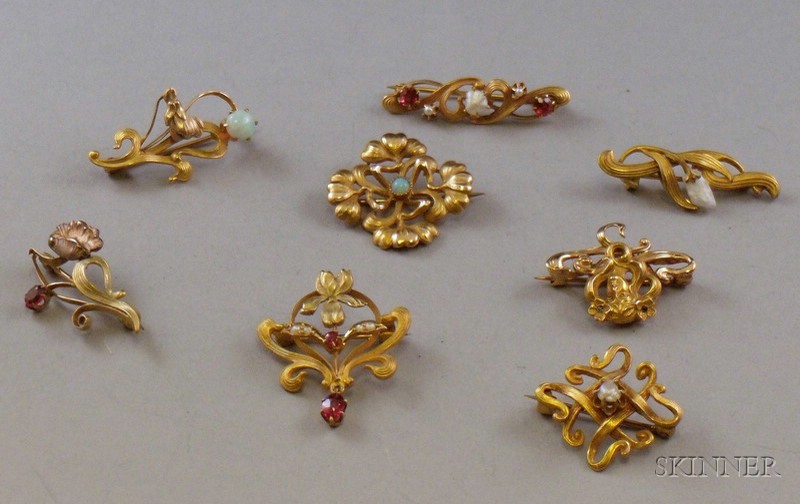 Appraisal: Eight Art Nouveau Pins each set with semi-precious stones or