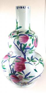 Appraisal: Chinese porcelain gourd form palace vase with blue bird lavender