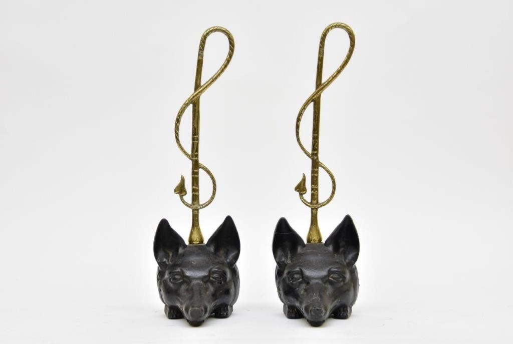 Appraisal: Two fox head cast iron and brass door stops th