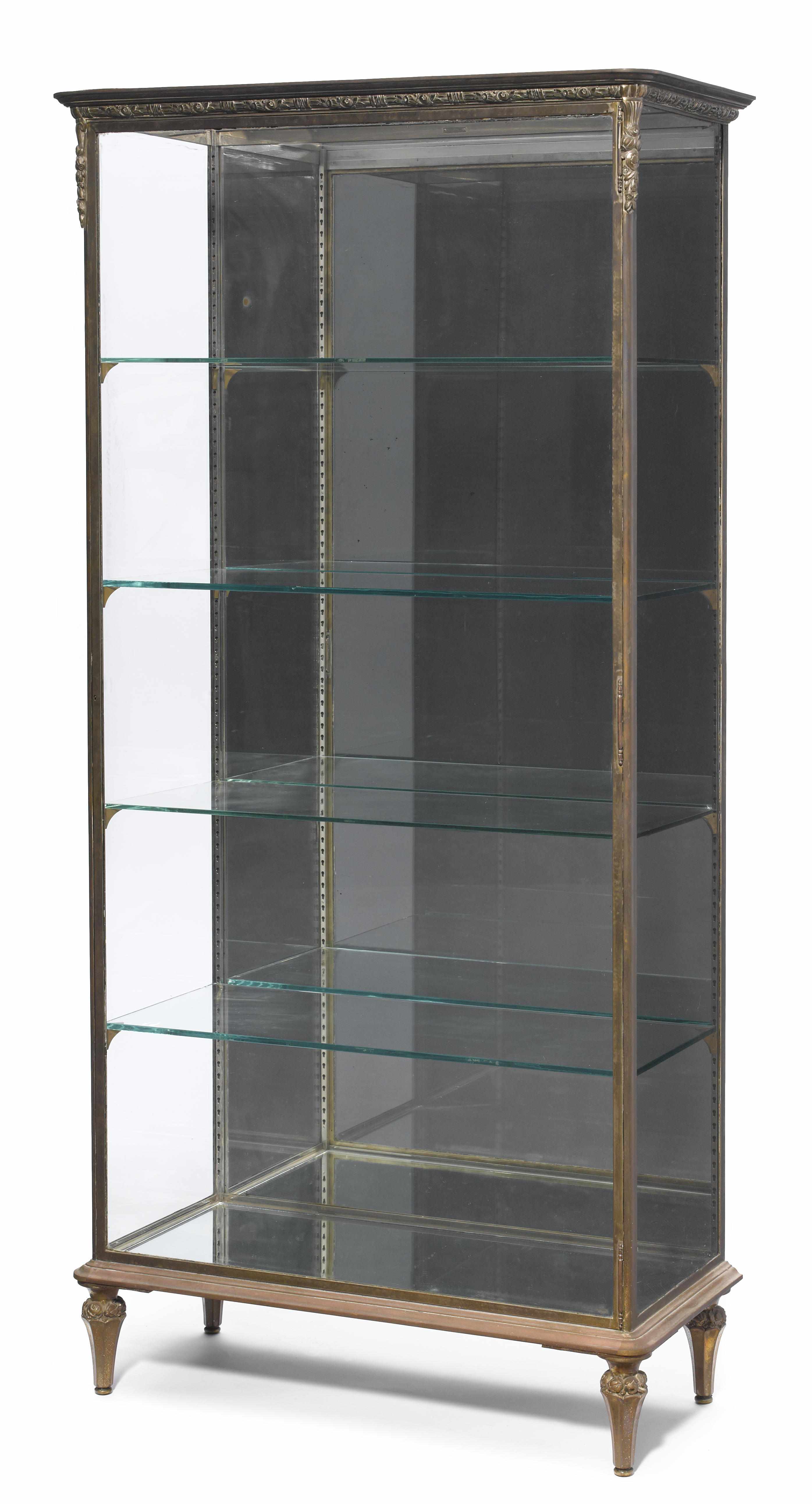 Appraisal: A French gilt and silvered metal vitrine Siegel Paris circa