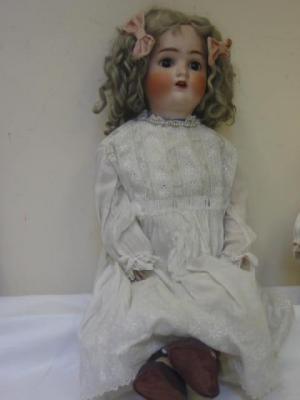 Appraisal: An Alt Beck and Gottschalk bisque head girl doll with