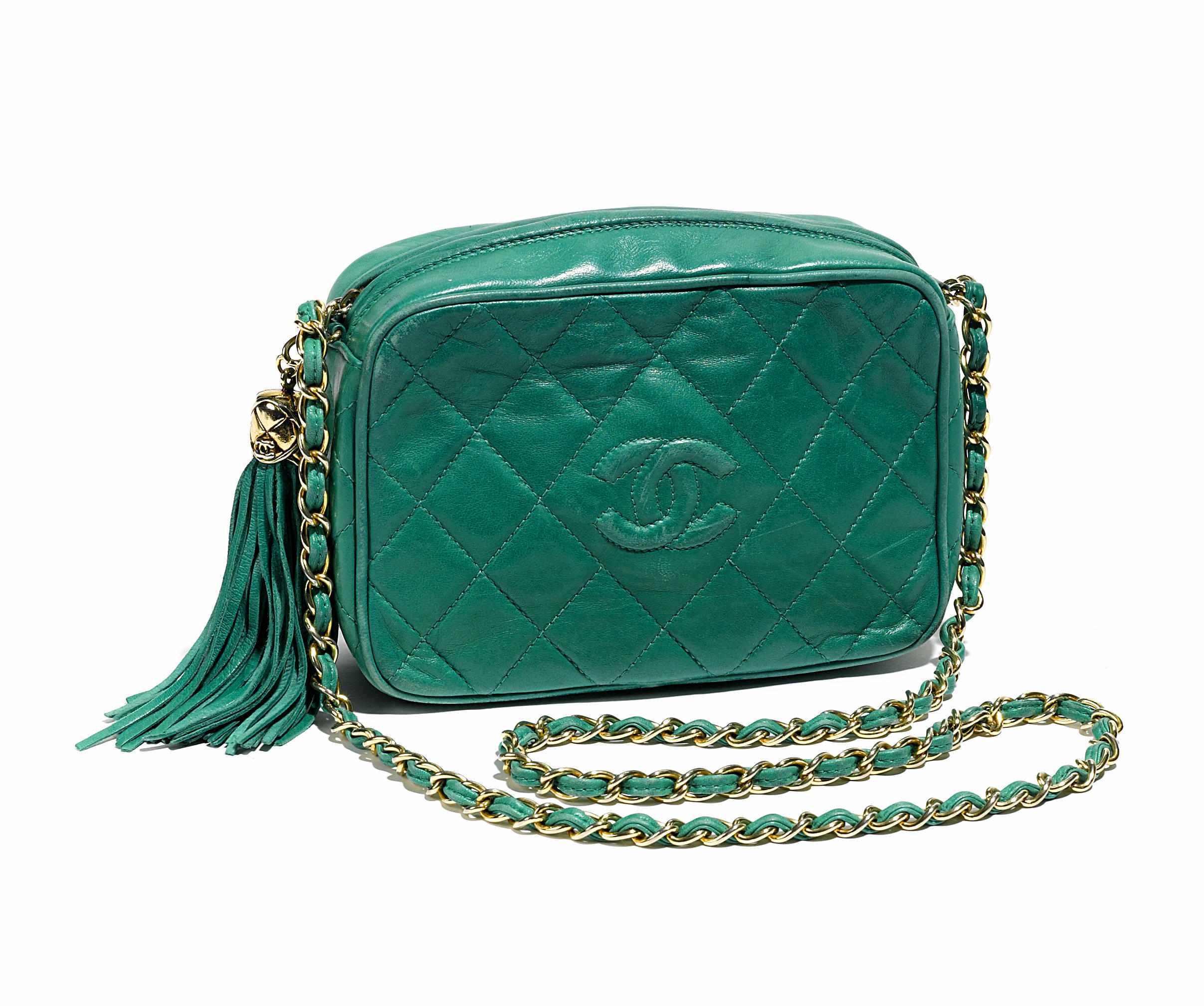 Appraisal: A Chanel green camera bag with tasseled zipper pullsize in