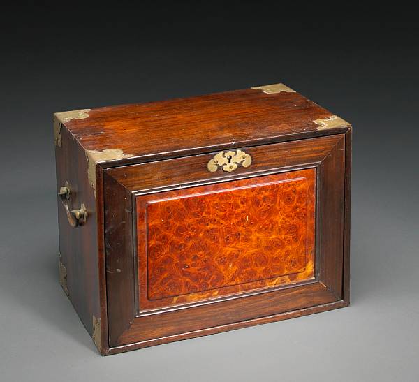 Appraisal: A hongmu and mixed wood storage cabinet Republic Period The