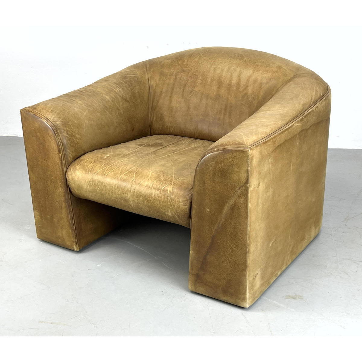 Appraisal: Light Brown Leather Modernist Lounge Chair Arched back Club Chair