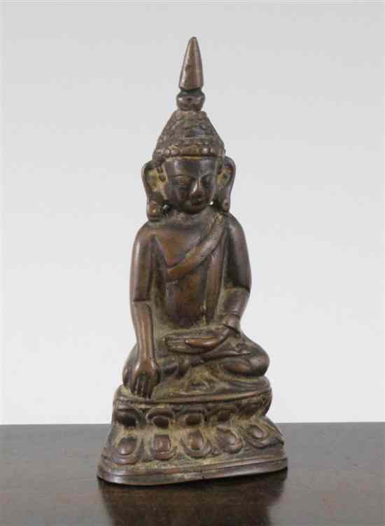 Appraisal: A South East Asian bronze seated figure of Buddha on